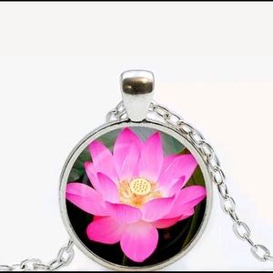 Pink lotus flower 
pendant silver color chain .